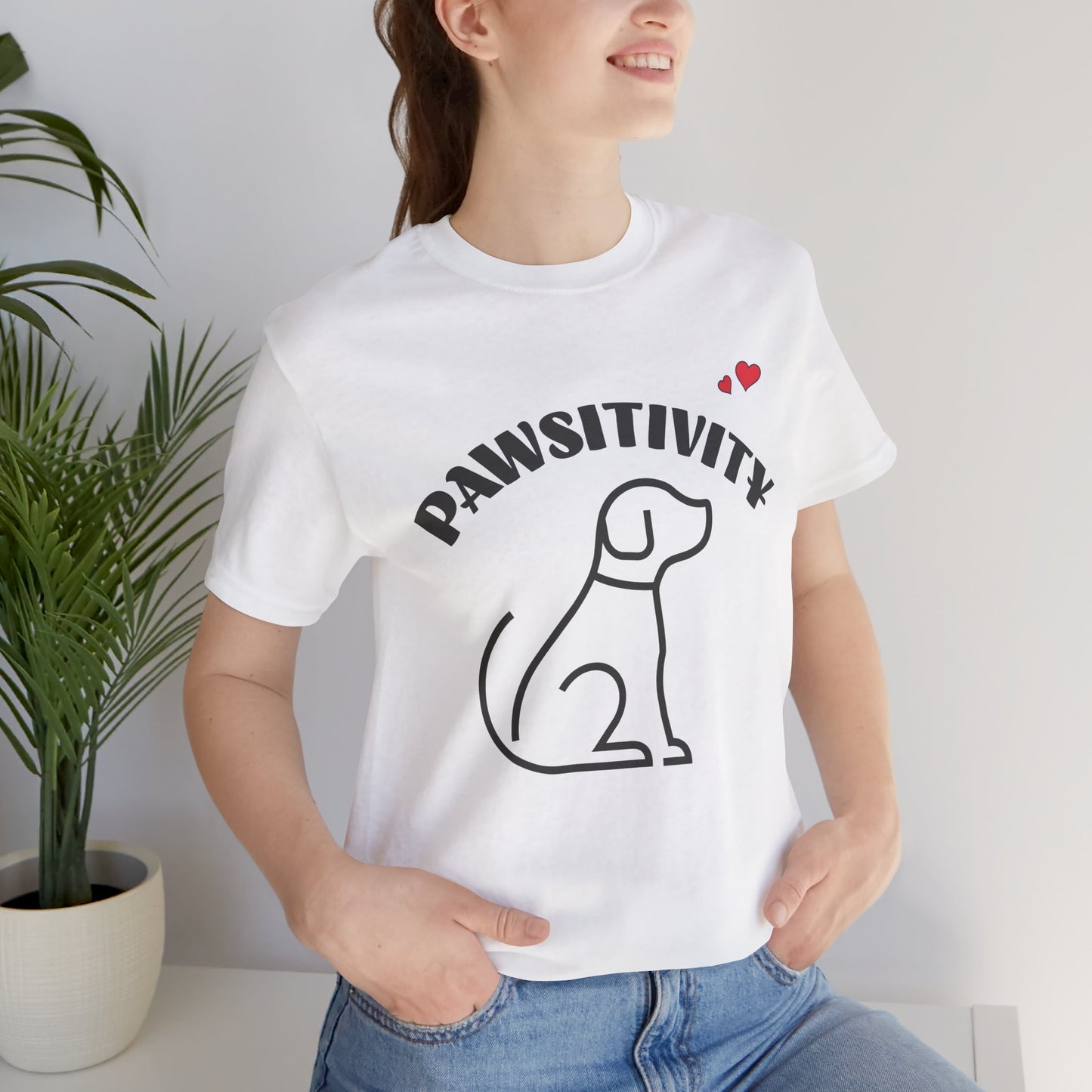 Pawsitivity dog mom t-shirt in white, front view / ...in white, front view / close-up of Pawsitivity line-art design
